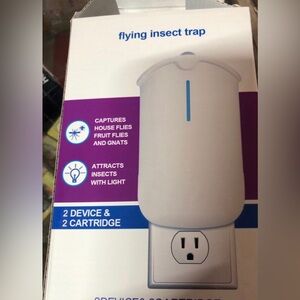 Flying insect trap plug in